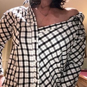 Asymmetrical plaid shirt. Size Large.